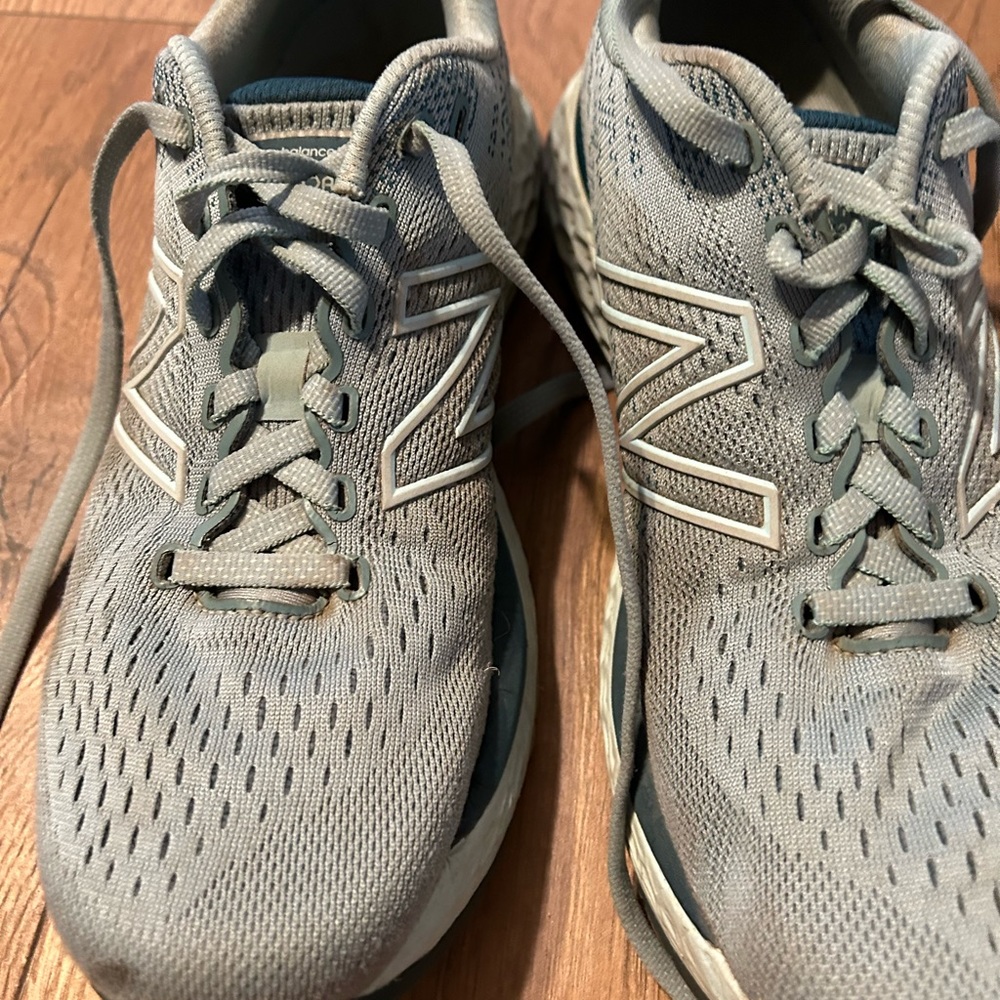 Blue tennis shoes really nice quality.